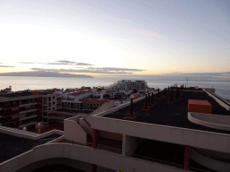 Buildings along the seaside, viewed from a parking lot next to the Avenida Quinto Centenario street