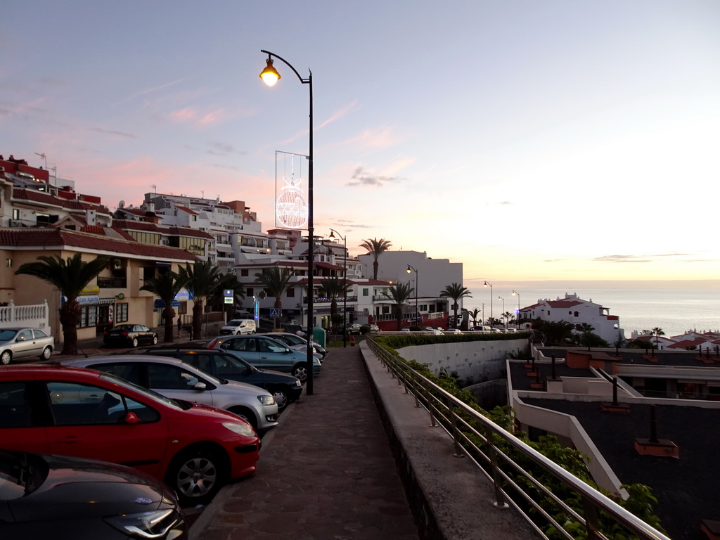 Buildings in the town center, viewed from a parking lot next to the Avenida Quinto Centenario street