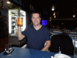 Tim with a Dorado beer at the Bar Restaurante Plaza at the town of Puerto de Santiago