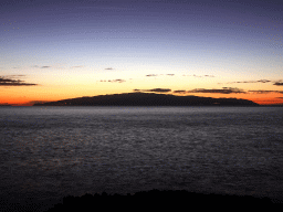 The island of La Gomera, viewed from the Plaza Puerto de Santiago square at the town of Puerto de Santiago, by night