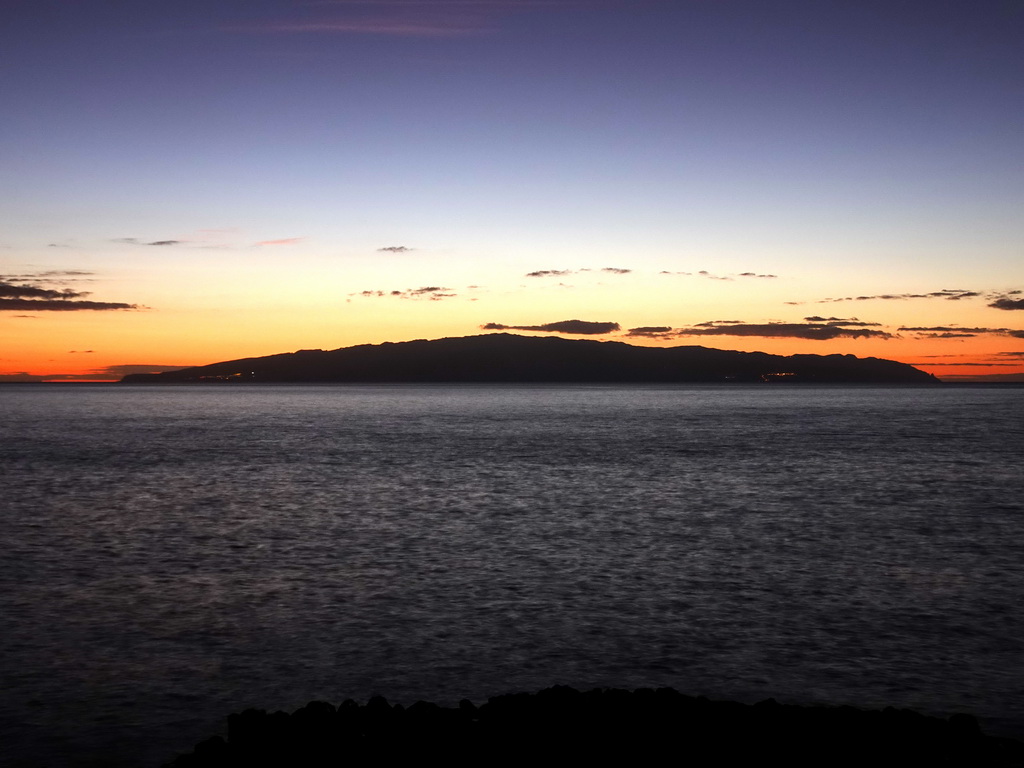 The island of La Gomera, viewed from the Plaza Puerto de Santiago square at the town of Puerto de Santiago, by night