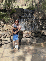 Miaomiao and Max in front of a waterfall at the entrance path to the Palmitos Park