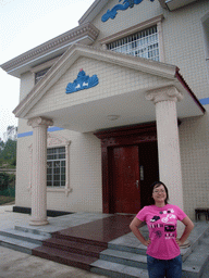 Miaomiao in front of her grandparents` house