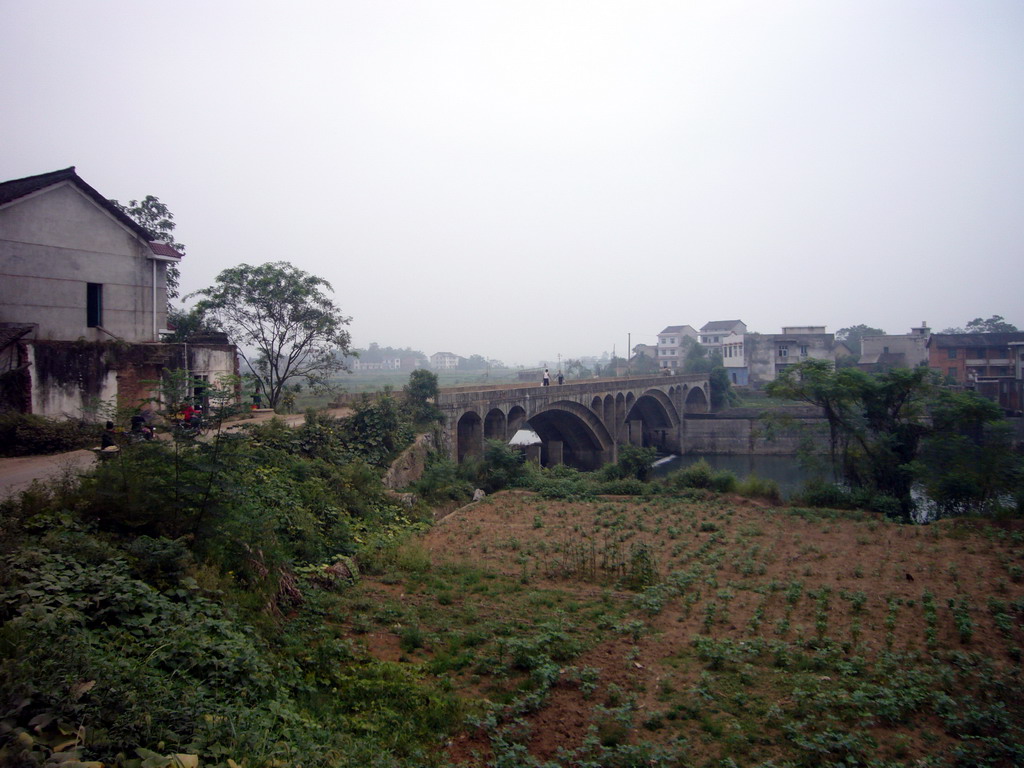 Bridge over river in Miaomiao`s grandparents` village