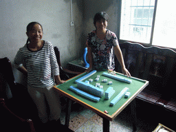 People from Miaomiao`s grandparents` village at the Mahjong table
