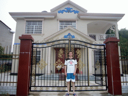 Tim at the front gate of Miaomiao`s grandparents` house