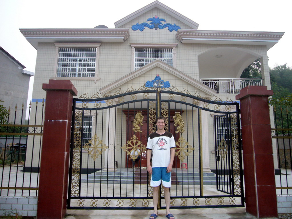 Tim at the front gate of Miaomiao`s grandparents` house