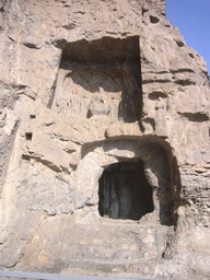 Cave and niche with Buddha statues at the Longmen Grottoes