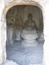 Cave with Buddha statue at the Longmen Grottoes