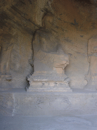 Cave with Buddha statue at the Longmen Grottoes