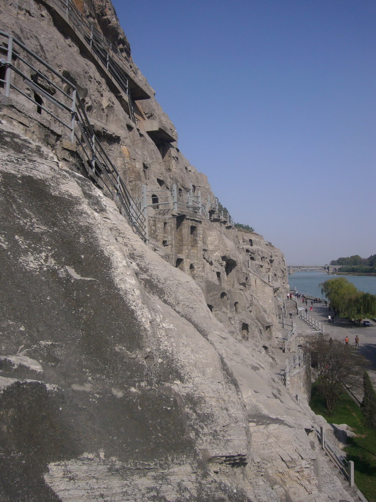 The west side of the Longmen Grottoes and the Bridge over the Yi River