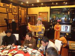 Ritual being performed in a restaurant near Luoyang