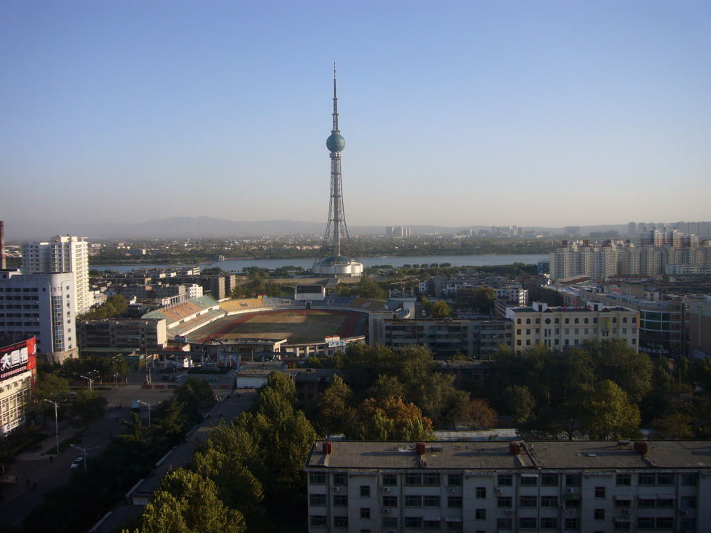 The Luoyang Zhongyuan Mingzhu Broadcast & TV Tower and surroundings, viewed from our room in a hotel in the city center
