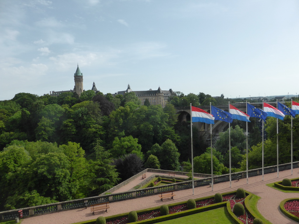 Garden with the flags of Luxembourg and the European Union, the Pont Adolphe bridge and the Building of the European Coal and Steel Community, viewed from the Boulevard Franklin Delano Roosevelt