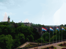 Garden with the flags of Luxembourg and the European Union, the Pont Adolphe bridge and the Building of the European Coal and Steel Community, viewed from the Boulevard Franklin Delano Roosevelt