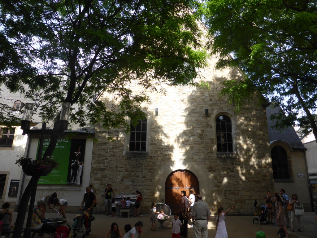 The Rue des Capucins street with playing children