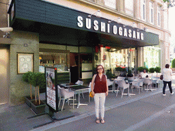 Miaomiao in front of the Sushi Ogasang restaurant at the Avenue de la Liberté