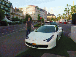 Tim with a Ferrari at the Place de la Constitution square