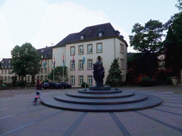 Miaomiao on her rental bike and the Grand Duchess Charlotte Monument at the Place Clairefontaine square