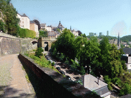 The Montée du Grund street with a gate, Saint Michael`s Church, the Grund district and the Kirchberg district