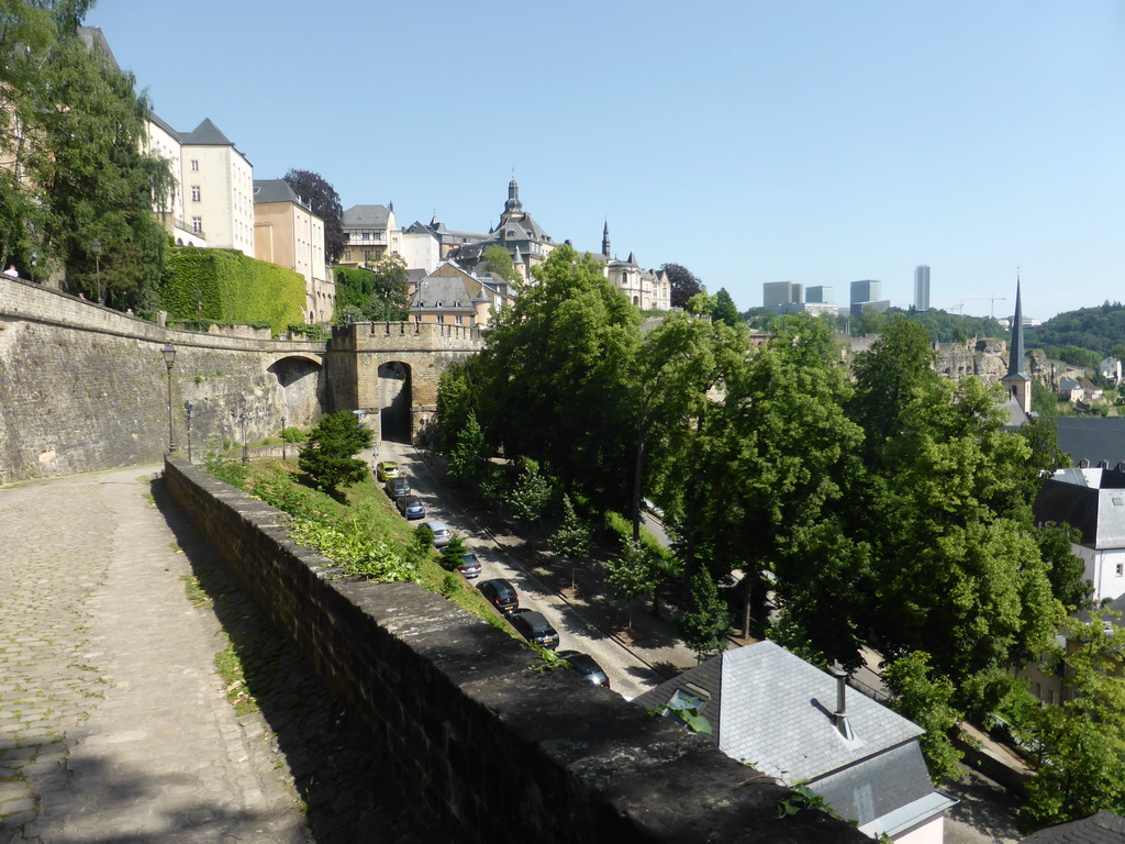 The Montée du Grund street with a gate, Saint Michael`s Church, the Grund district and the Kirchberg district