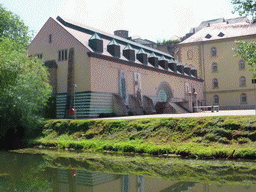 The Alzette-Uelzecht river and the northeast building of the Abbey of Neumünster