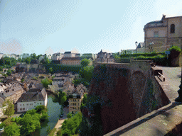 The Grund district with the Alzette-Uelzecht river and the State Archives building, viewed from the northeast end of the Chemin de la Corniche street