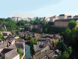 The Grund district with the Alzette-Uelzecht river, the Rue Münster bridge and the State Archives building, viewed from the Chemin de la Corniche street