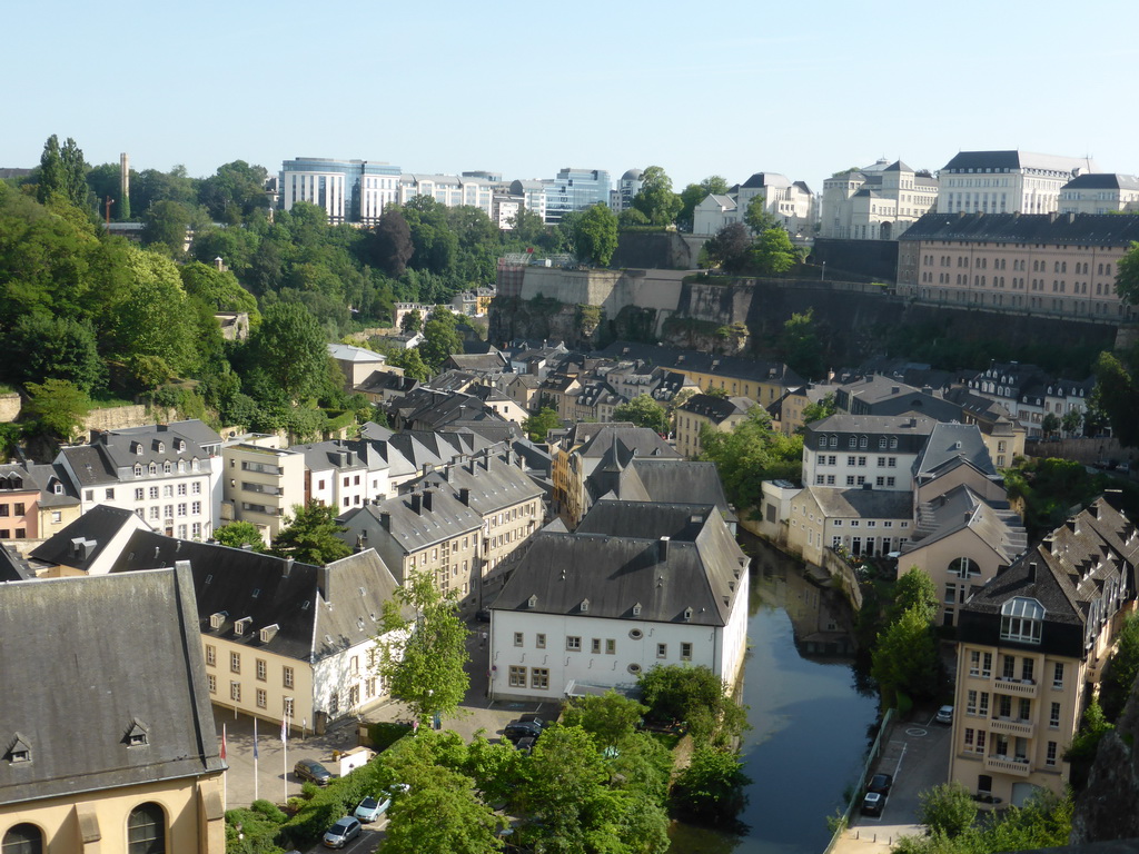 The Grund district with the Alzette-Uelzecht river and the State Archives building, viewed from the northeast end of the Chemin de la Corniche street