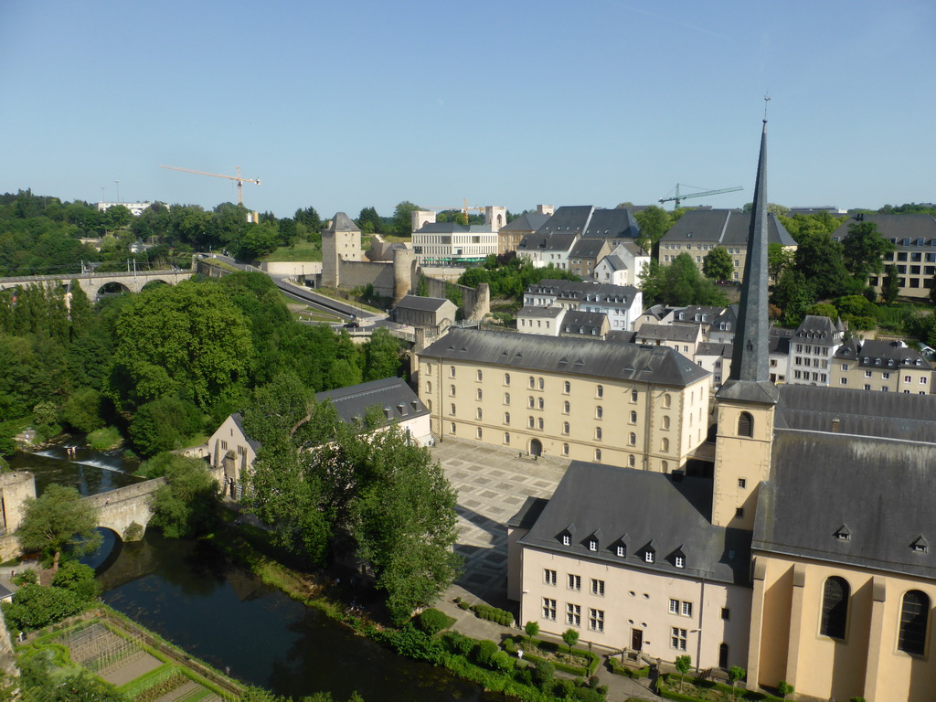 The Grund district with the Wenzel Wall, the Alzette-Uelzecht river, the Abbey of Neumünster, the Johanneskirche church and the Rham Plateau, viewed from the Chemin de la Corniche street
