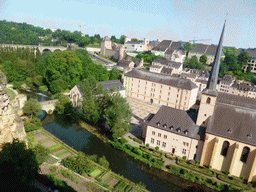 The Grund district with the Wenzel Wall, the Alzette-Uelzecht river, the Abbey of Neumünster, the Johanneskirche church and the Rham Plateau, viewed from the Chemin de la Corniche street