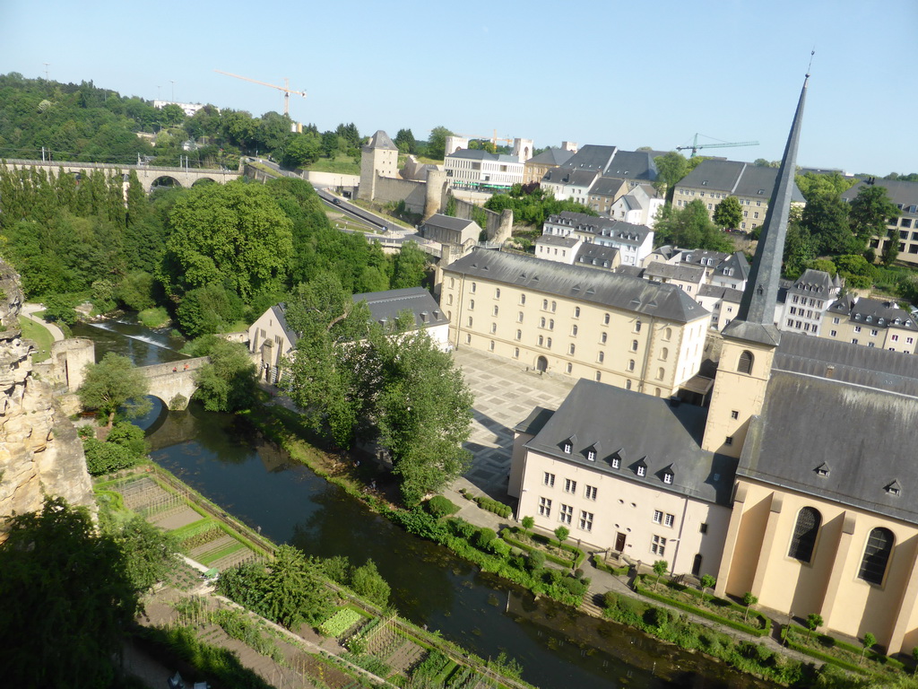 The Grund district with the Wenzel Wall, the Alzette-Uelzecht river, the Abbey of Neumünster, the Johanneskirche church and the Rham Plateau, viewed from the Chemin de la Corniche street