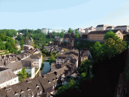 The Grund district with the Alzette-Uelzecht river, the Rue Münster bridge and the State Archives building, viewed from the Chemin de la Corniche street