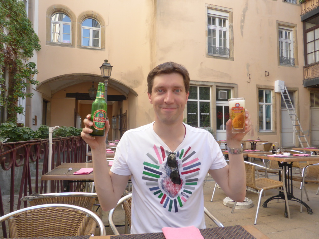Tim with Tsingtao beer at the Ming Dynasty restaurant at the Grand-Rue street