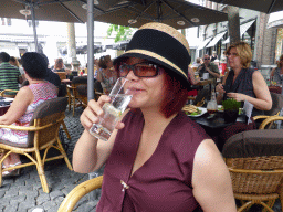 Miaomiao having a drink at the C`est la vie restaurant at the Sint Amorsplein square