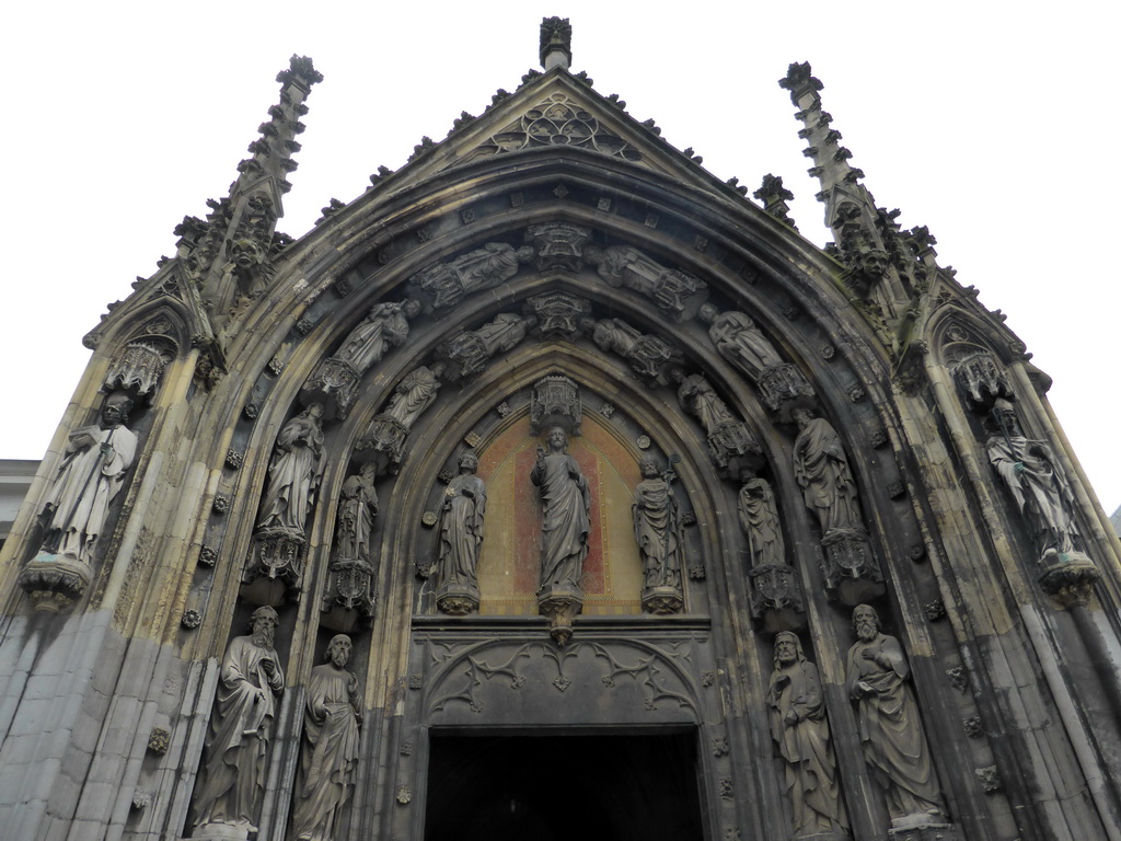 Facade above the entrance to the cloister of the Sint-Servaasbasiliek church at the Keizer Karelplein square