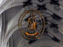 Statuette hanging from the ceiling of the nave of the Sint-Servaasbasiliek church