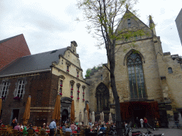 The west side of the Brasserie Amadeus building and the Dominicanenkerk church at the Dominicanerplein square