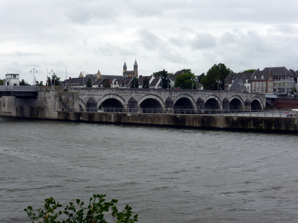 The Sint Servaasbrug bridge over the Maas river and the city center with the Basilica of Our Lady, viewed from the Oeverwal street