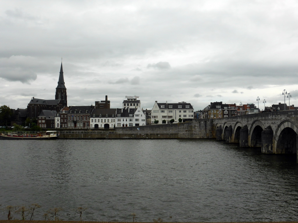 The Sint Servaasbrug bridge over the Maas river and the Oeverwal street with the Sint-Martinuskerk church and the Ridder Brewery, viewed from the Maaspromenade street