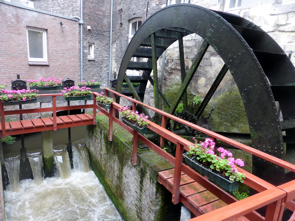 The Bisschopsmolen watermill at the Jeker river at the back side of the Bisschopsmolen bakery