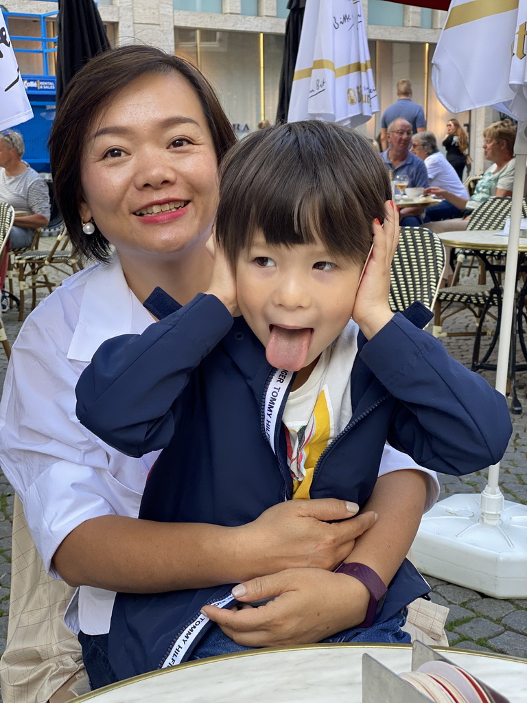 Miaomiao and Max on the terrace of the Brasserie Amadeus restaurant at the Dominicanerplein square