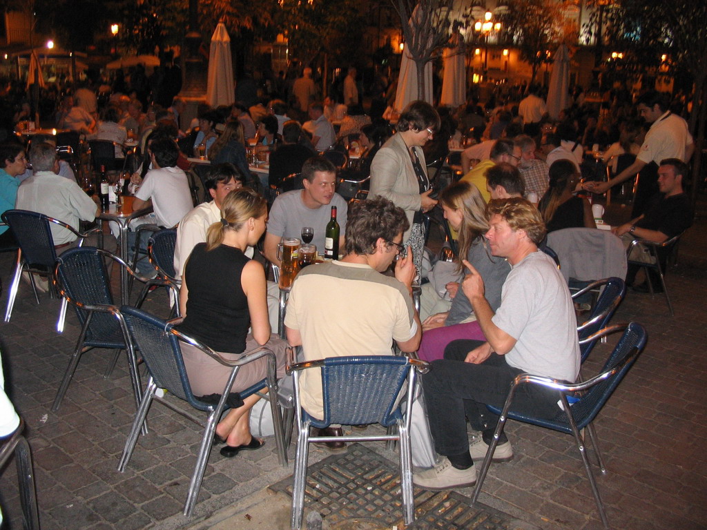 Terrace bar in the city center, by night