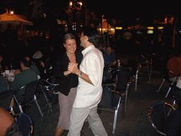 Terrace bar in the city center, by night