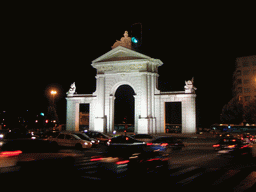 The Puerta de San Vicente gate at the Glorieta San Vicente square, by night