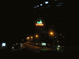 Side of the Casino Gran Madrid Torrelodones, viewed from the taxi at the A6 road, by night