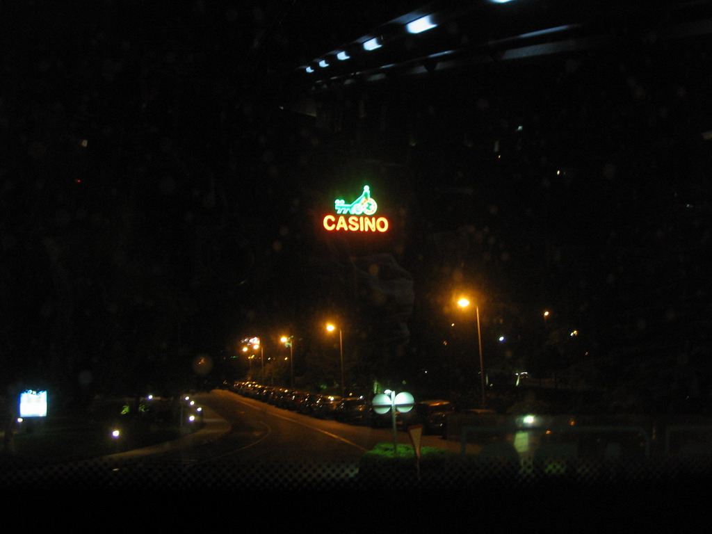 Side of the Casino Gran Madrid Torrelodones, viewed from the taxi at the A6 road, by night
