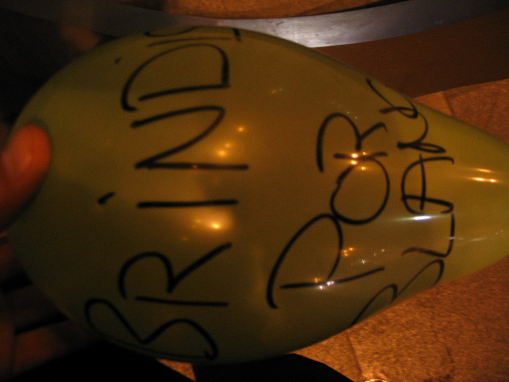 Balloon on a street in the city center, by night