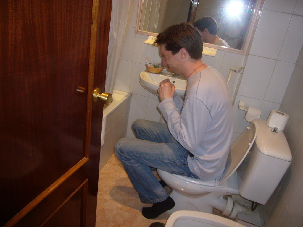Tim on the toilet of our room in the hotel `Euromadrid`