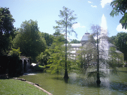 The Palacio de Cristal, with the fountain in the lake in front, in the Parque del Buen Retiro park
